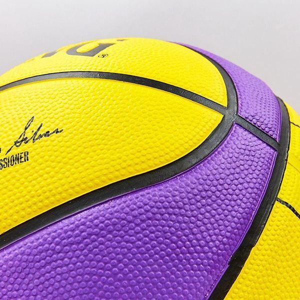 М'яч баскетбольний гумовий №7 SPALDING 83510Z NBA Team LA LAKERS (гума, бутил, жовтий-фіолетовий) &mdash; купити в Україні